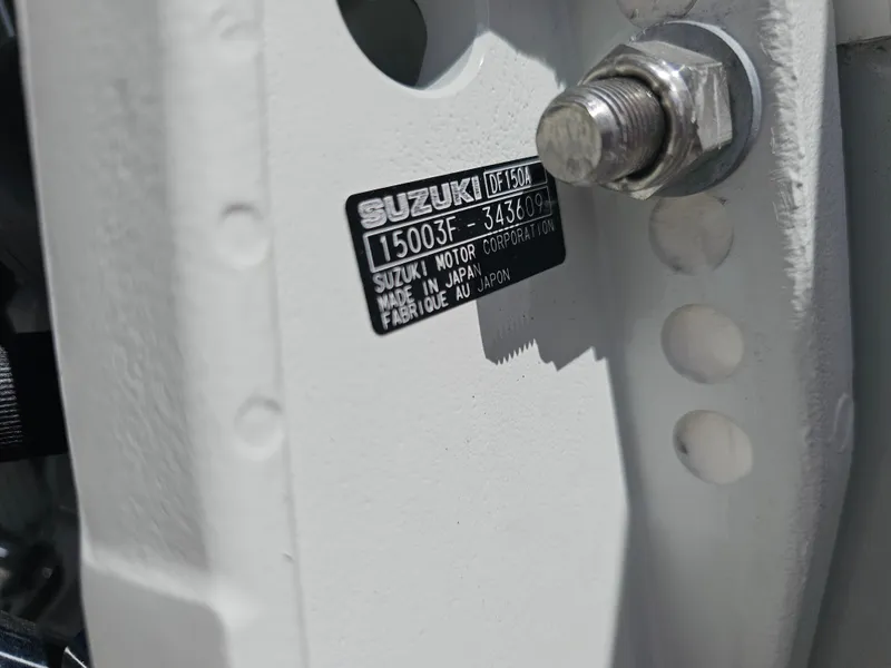 Slide: The Image of Close-up of a Suzuki engine label on a Savannah SS21, 2025 model. - 8