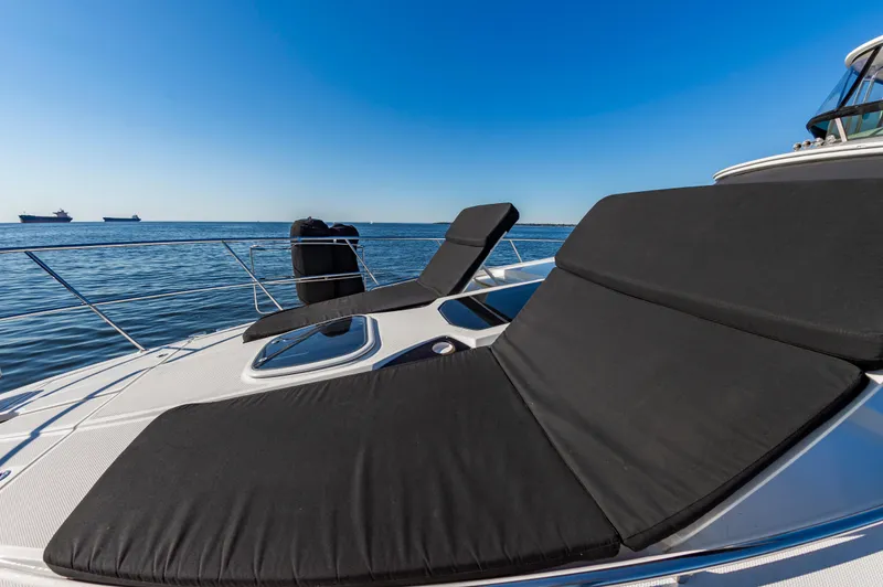 Slide: The Image of 2011 Meridian 541 Sedan yacht with sun loungers on deck, ocean view. - 17