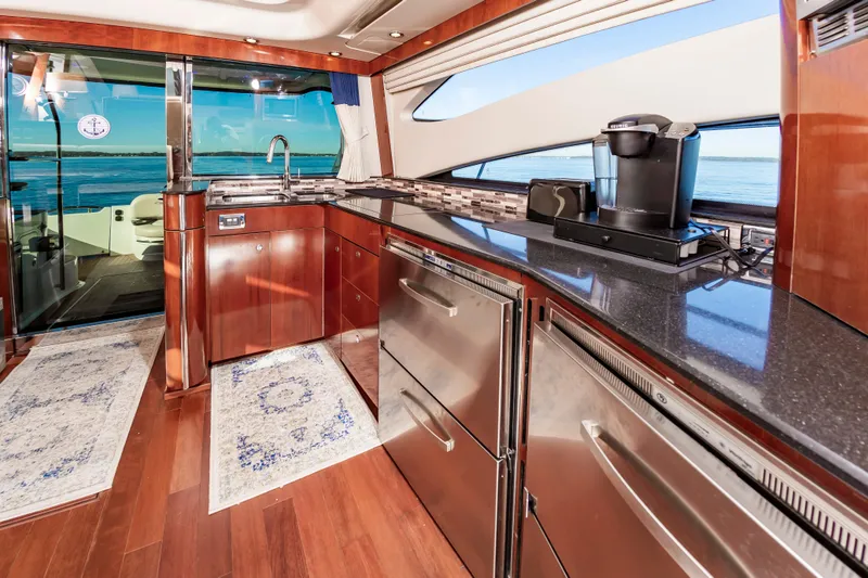 Slide: The Image of Luxurious kitchen interior of 2011 Meridian 541 Sedan yacht with ocean view. - 23