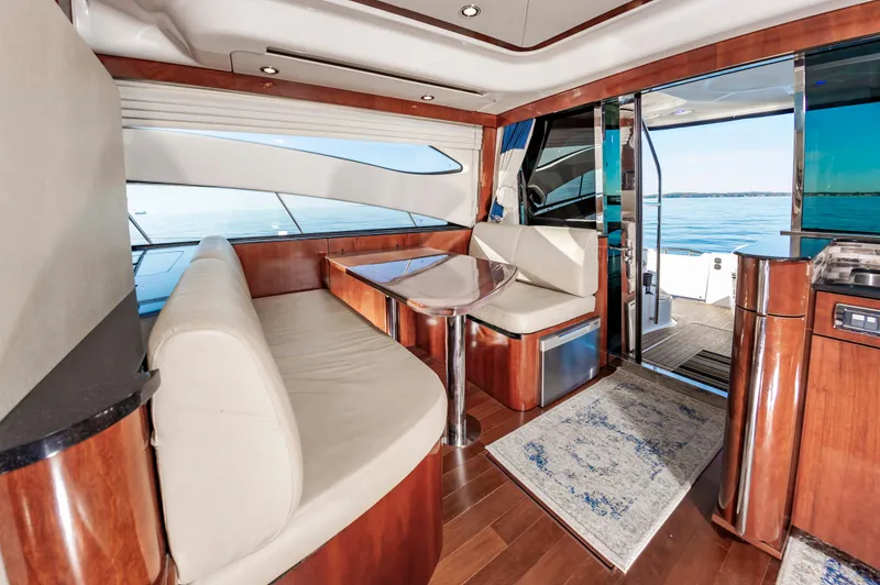 Slide: The Image of Luxurious interior of 2011 Meridian 541 Sedan yacht with elegant seating and ocean view. - 24