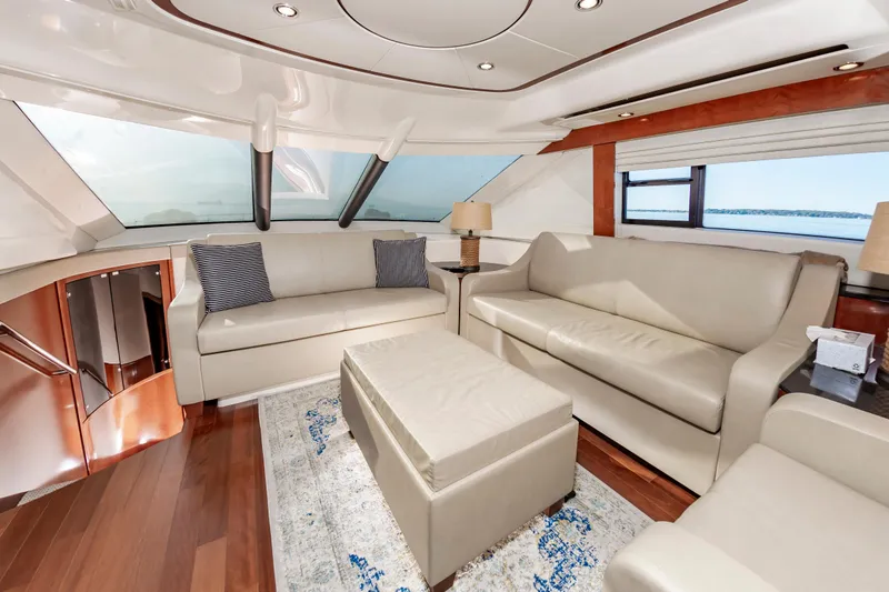 Slide: The Image of Luxurious interior of 2011 Meridian 541 Sedan yacht with leather seating and panoramic windows. - 26