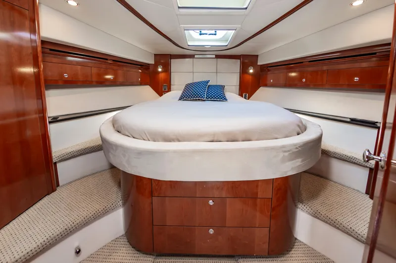 Slide: The Image of Luxurious bedroom interior of 2011 Meridian 541 Sedan yacht with elegant wood finishes. - 36