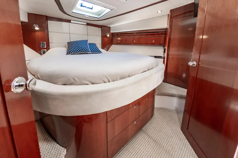 Slide: The Image of Luxurious bedroom interior of 2011 Meridian 541 Sedan yacht with elegant wood finish. - 37