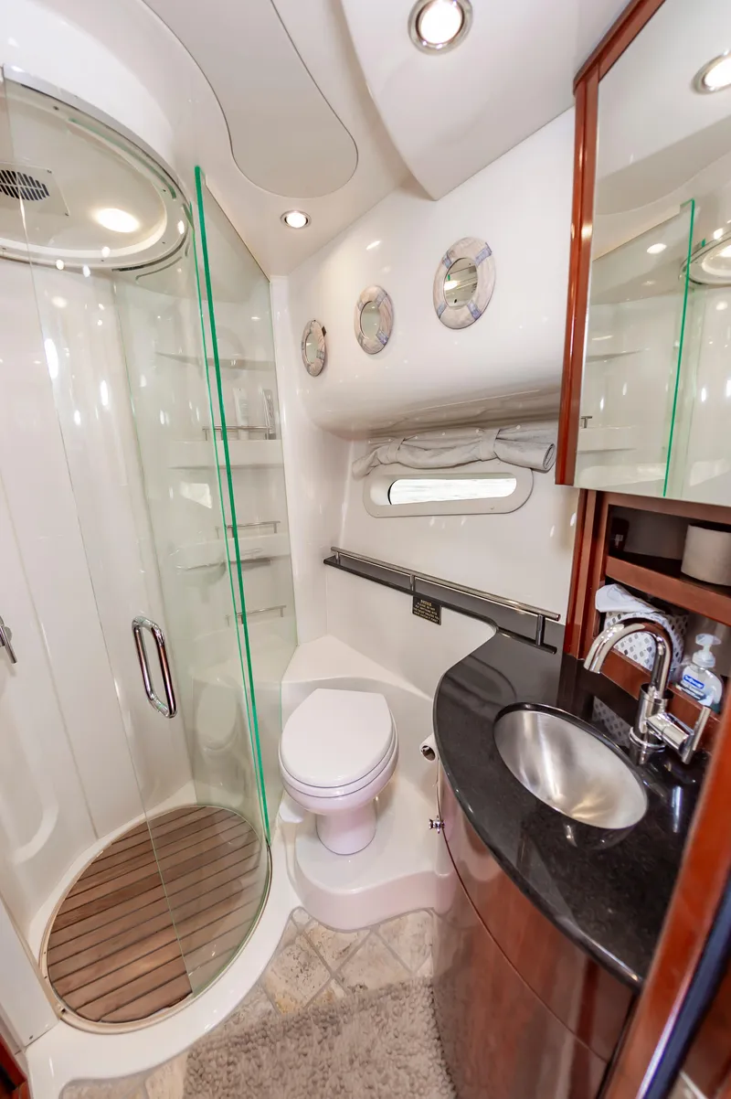 Slide: The Image of Luxurious bathroom in 2011 Meridian 541 Sedan yacht with modern shower and sleek fixtures. - 41