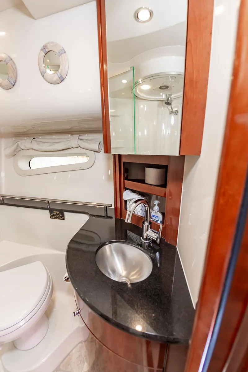 Slide: The Image of Luxurious bathroom in 2011 Meridian 541 Sedan yacht with modern fixtures and elegant design. - 42