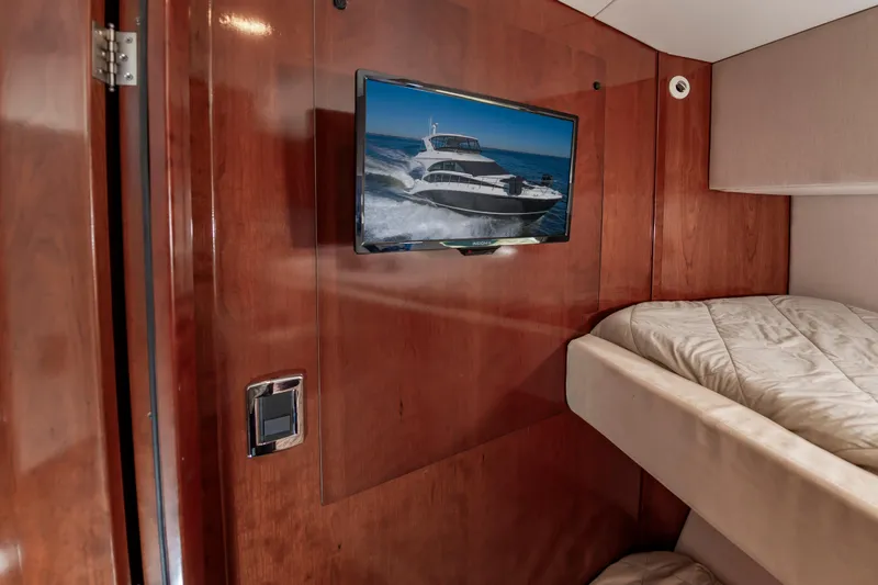 Slide: The Image of Interior of 2011 Meridian 541 Sedan with TV and wooden paneling. - 48