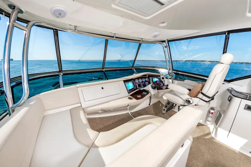 Slide: The Image of Interior of 2011 Meridian 541 Sedan yacht with panoramic ocean view. - 7