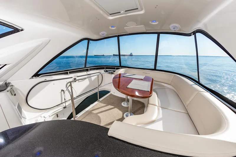 Slide: The Image of Luxurious interior of 2011 Meridian 541 Sedan yacht with panoramic ocean view. - 8