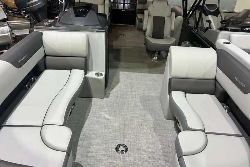 Slide: The Image of 2025 Veranda Relax VR22RC pontoon boat interior with gray seating and modern design. - 3