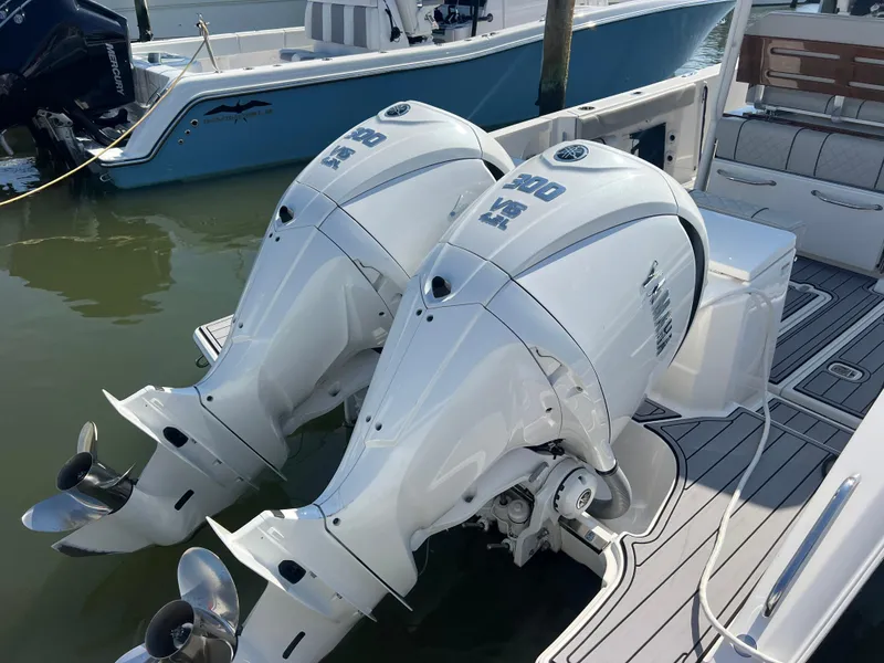 Slide: The Image of 2023 Pursuit S 288 Sport boat with twin Yamaha 300 V6 outboard engines. - 38