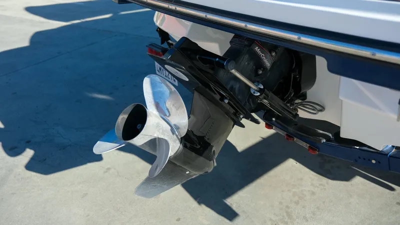 Slide: The Image of 2013 Sea Ray 210 SLX boat propeller and stern drive detail. - 20