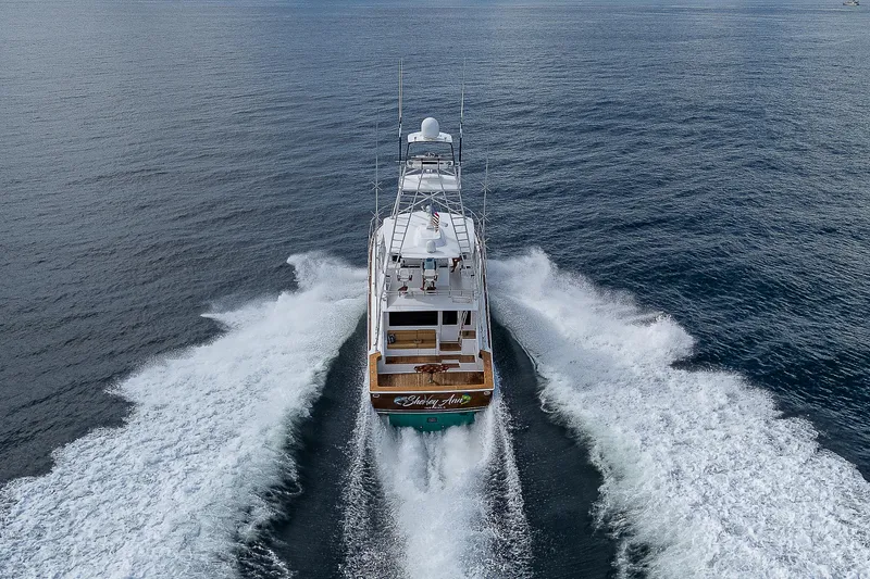Slide: The Image of Aerial view of 2003 Viking Convertible yacht cruising on open water. - 45