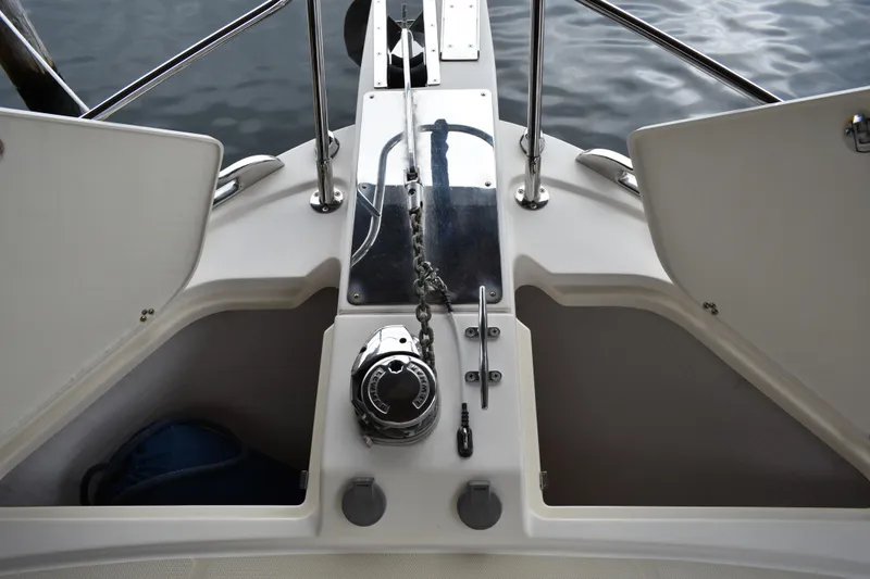 Slide: The Image of 2011 Sabre 42 Salon Express bow deck with anchor chain and winch. - 16