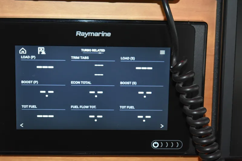 Slide: The Image of Raymarine display on 2011 Sabre 42 Salon Express showing engine and fuel metrics. - 21