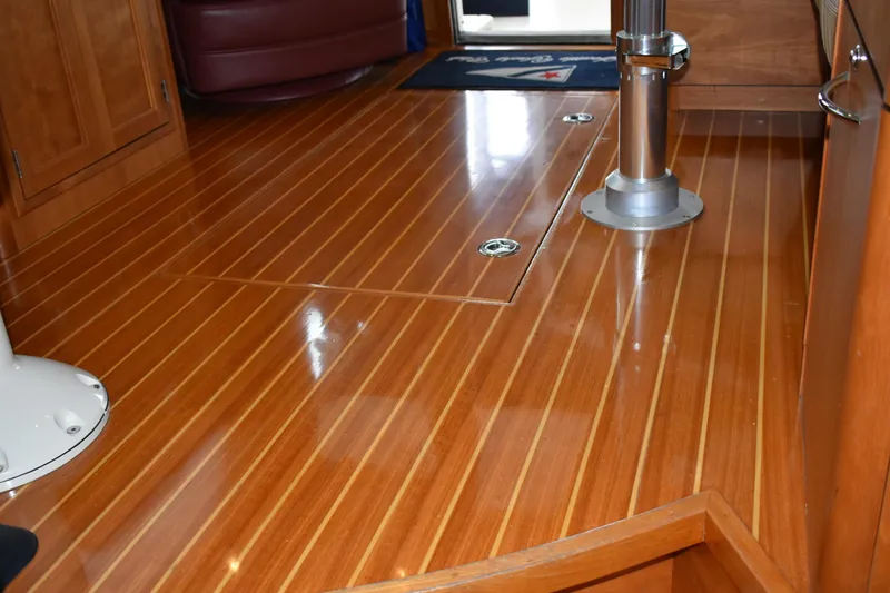 Slide: The Image of Polished wooden floor of 2011 Sabre 42 Salon Express yacht interior. - 26