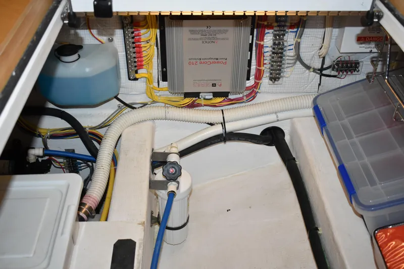 Slide: The Image of Engine room of 2011 Sabre 42 Salon Express with wiring and components. - 44