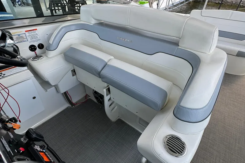 Slide: The Image of 2020 Formula 370 SS boat interior with white and gray seating. - 19