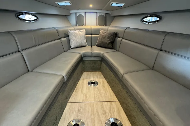 Slide: The Image of 2020 Formula 370 SS boat interior with luxurious seating and modern design. - 22