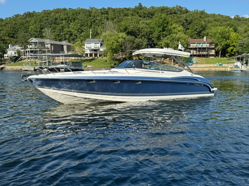 Slide: The Image of 2020 Formula 370 SS boat on a lake with scenic forest background. - 3