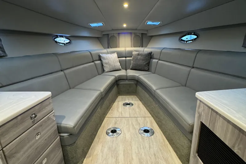Slide: The Image of 2020 Formula 370 SS boat interior with luxurious seating and modern design. - 33