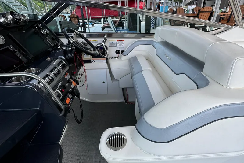 Slide: The Image of Interior of 2020 Formula 370 SS boat with white seating and modern dashboard. - 37