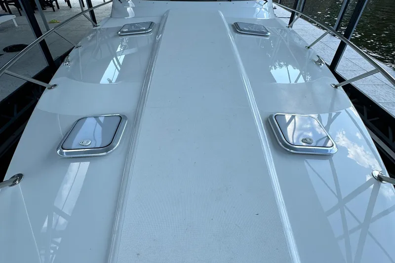 Slide: The Image of 2020 Formula 370 SS boat deck with sleek design and chrome accents. - 39