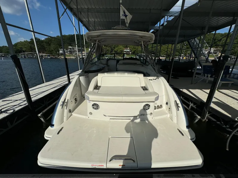 Slide: The Image of 2020 Formula 370 SS boat docked under a covered marina. - 8