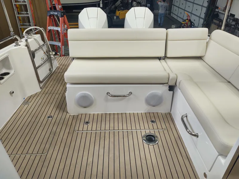 Slide: The Image of Luxurious 2022 MJM 3 boat interior with white seating and teak flooring. - 30