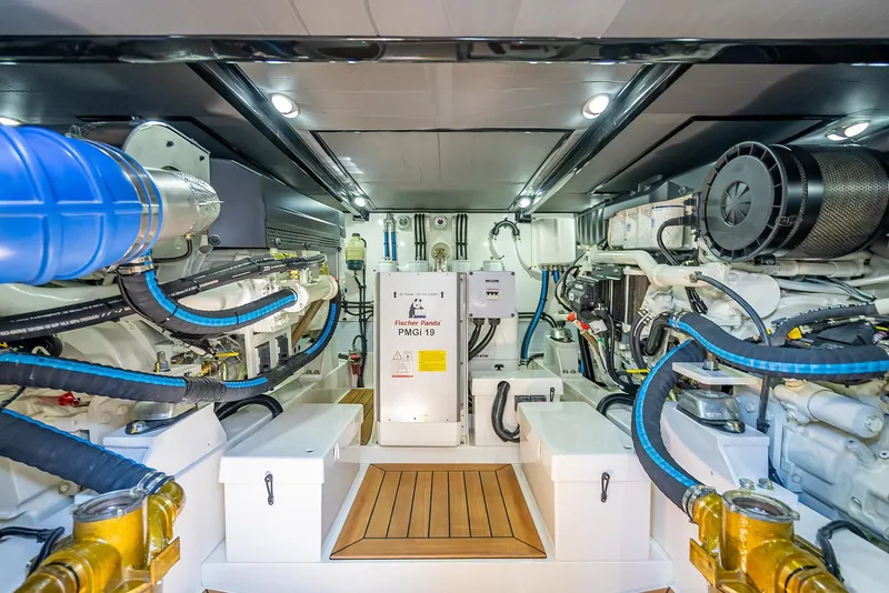 Slide: The Image of Engine room of 2026 Grand Banks GB 54 yacht, showcasing advanced machinery and equipment. - 25