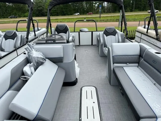 Slide: The Image of 2025 Veranda Vista Sport VS 22 RC pontoon boat with spacious seating and modern design. - 4