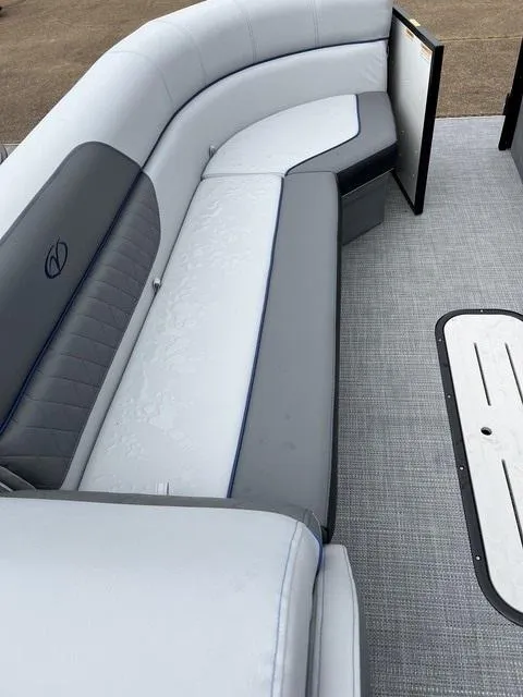 Slide: The Image of 2025 Veranda Vista Sport VS 22 RC boat interior with gray seating and flooring. - 6