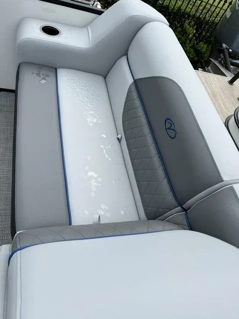 Slide: The Image of 2025 Veranda Vista Sport VS 22 RC boat seat with gray and white upholstery. - 8