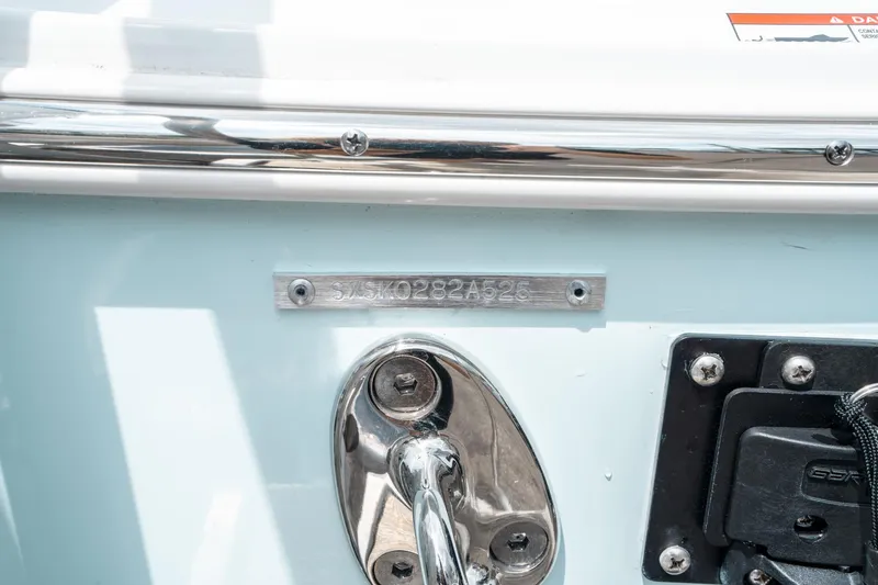 Slide: The Image of 2025 Sea Hunt Ultra 275 SE boat identification plate and hardware detail. - 45