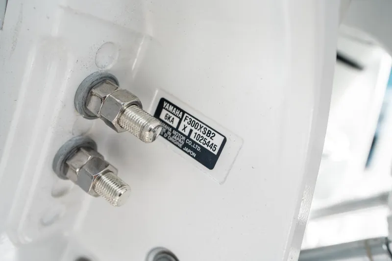 Slide: The Image of Close-up of Yamaha engine bolts on 2025 Sea Hunt Gamefish 30 CB. - 43