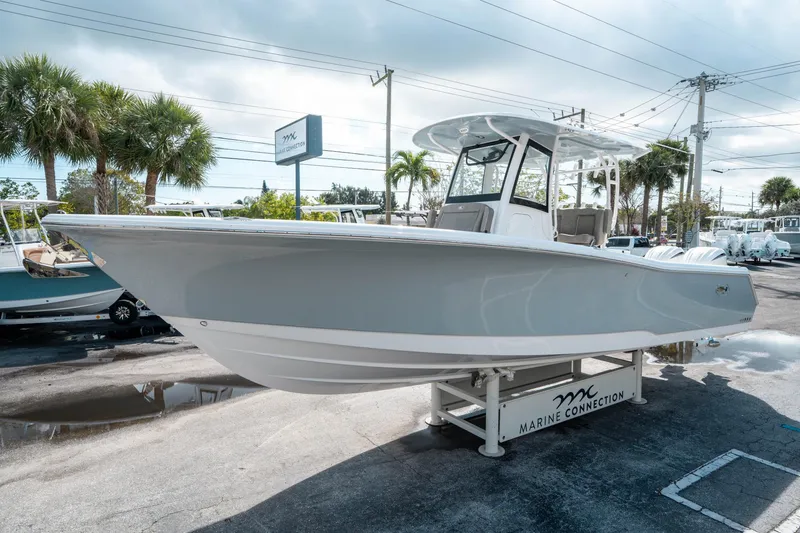 Slide: The Image of 2025 Sea Hunt Gamefish 30 CB boat displayed at Marine Connection dealership. - 6