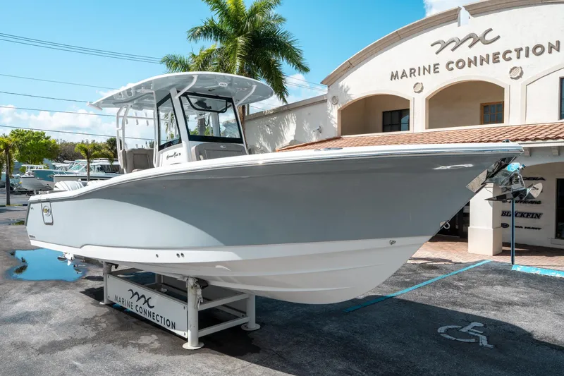 Slide: The Image of 2025 Sea Hunt Gamefish 30 CB boat displayed at Marine Connection dealership. - 8