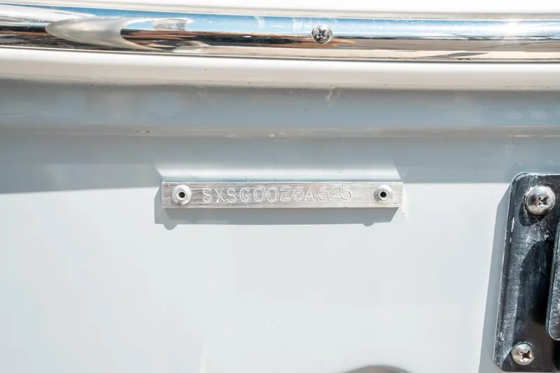 Slide: The Image of 2025 Sea Hunt Gamefish 30 CB hull identification number plate. - 44