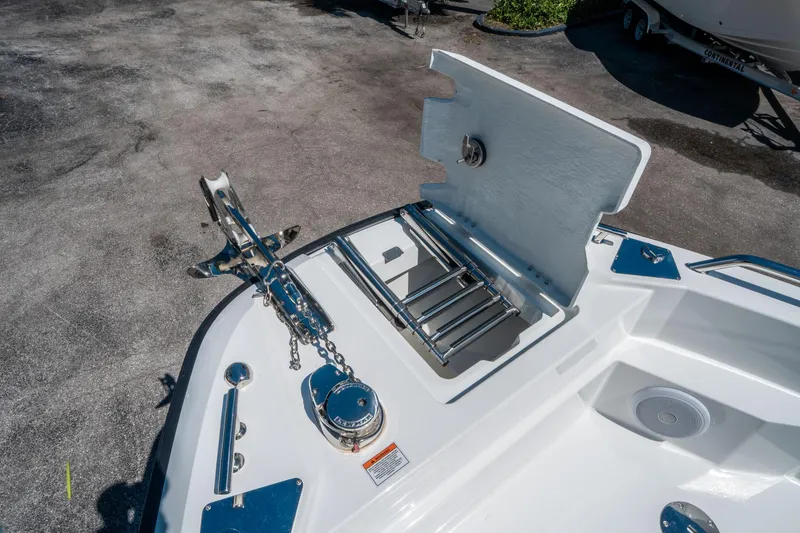 Slide: The Image of 2025 Quarken 27 T-Top boat anchor and storage compartment detail. - 20