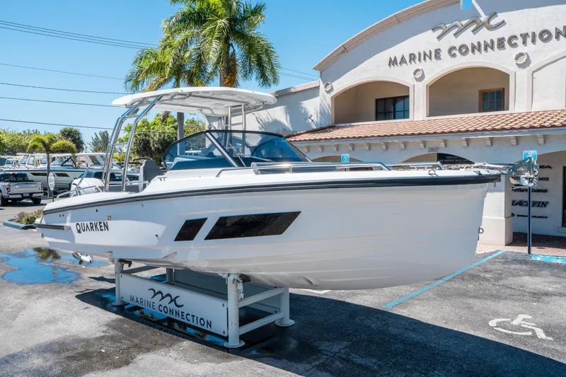 Slide: The Image of 2025 Quarken 27 T-Top boat displayed at Marine Connection dealership. - 8