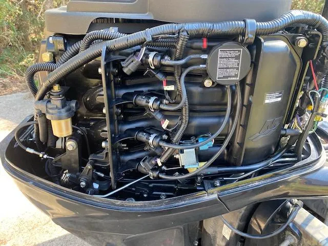 Slide: The Image of 2018 Crestliner 1860 Retriever Jon boat engine, detailed view of internal components. - 12