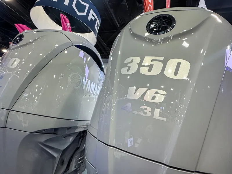 Slide: The Image of 2025 Sea Fox 328 Commander boat with dual outboard engines, rear view. - 5