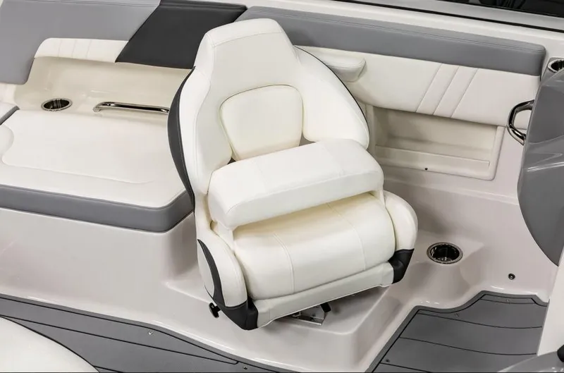 Slide: The Image of 2025 Chaparral 23 SSi OB boat interior with plush white seating and modern design. - 6