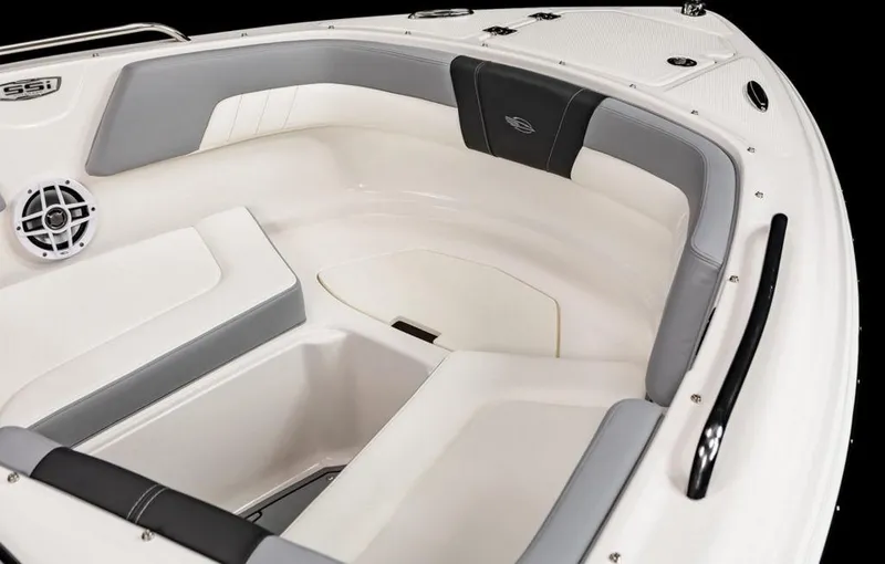 Slide: The Image of 2025 Chaparral 23 SSi OB boat interior with cushioned seating and speaker. - 8