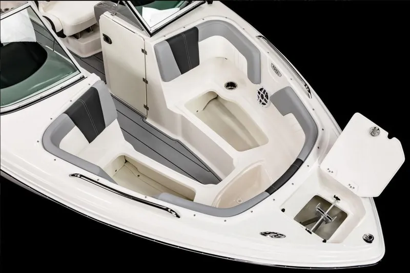 Slide: The Image of 2025 Chaparral 23 SSi OB boat interior with seating and storage compartments. - 9