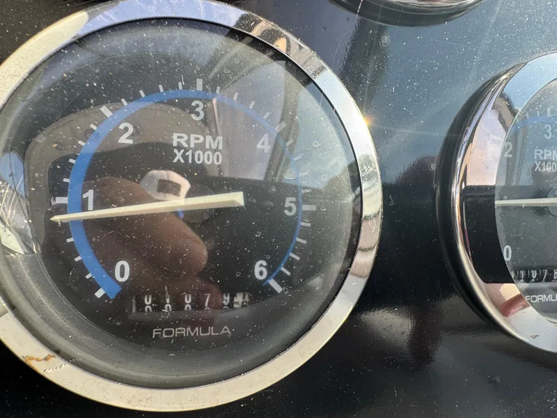 Slide: The Image of Luxurious interior of a 2005 Formula 34 Performance Cruiser with plush seating and elegant decor. - 11