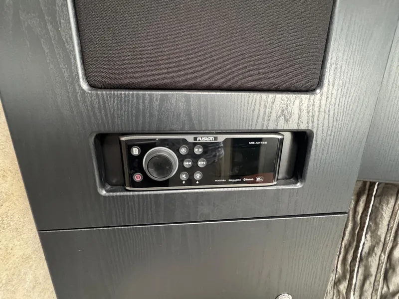 Slide: The Image of Interior of 2005 Formula 34 PC yacht with beige seating and wooden table. - 16