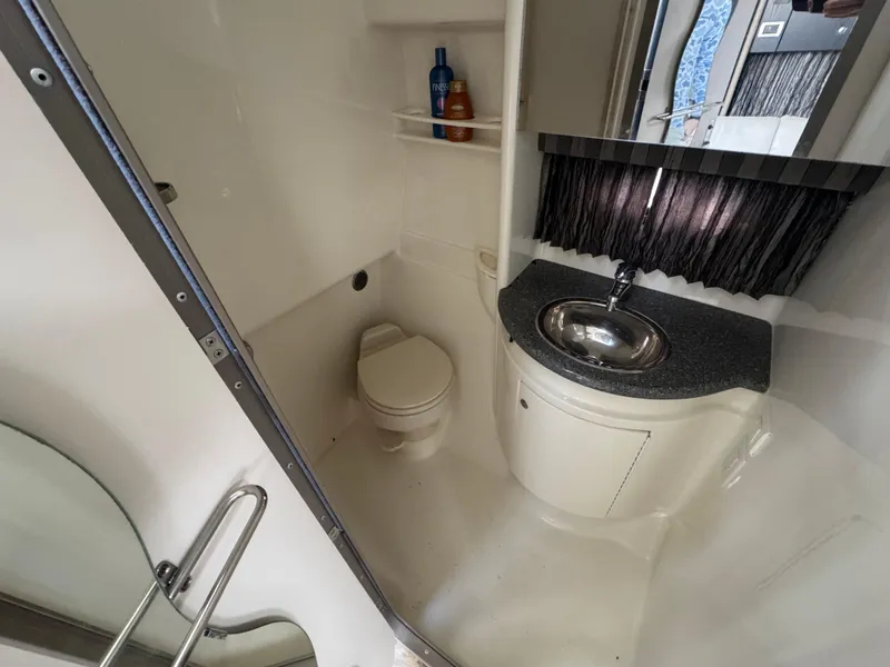 Slide: The Image of Interior of 2005 Formula 34 PC yacht with beige leather seating and modern design. - 18