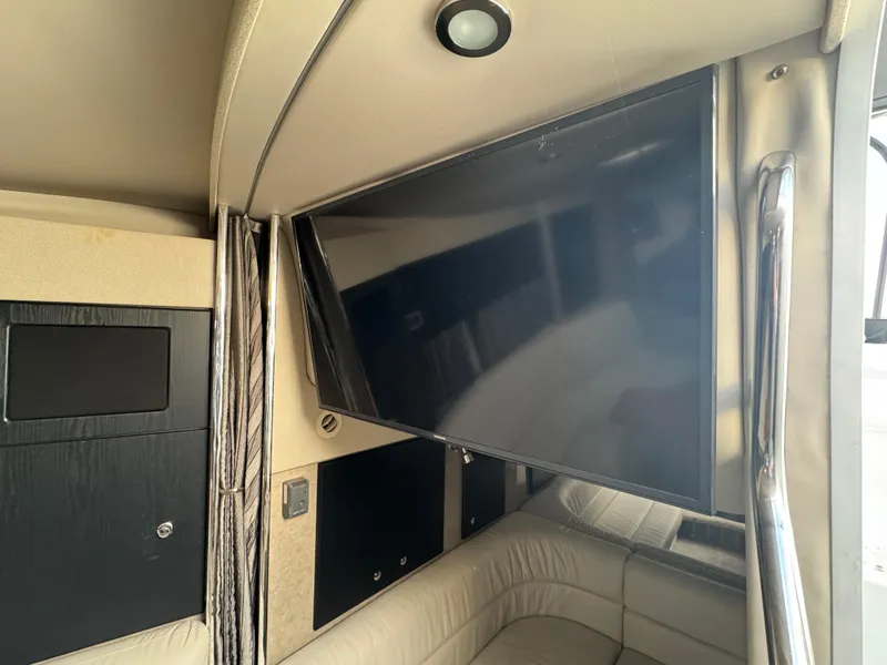 Slide: The Image of Engine room of a 2005 Formula 34 PC boat, featuring dual engines and battery setup. - 23