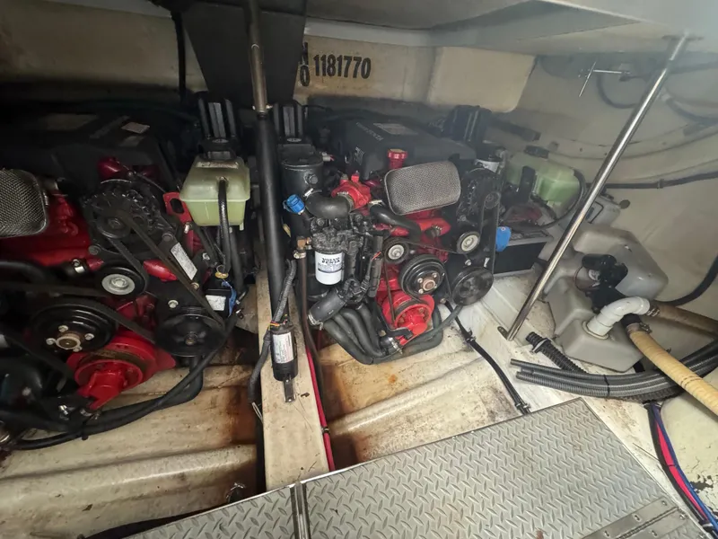 Slide: The Image of Control panel of a 2005 Formula 34 PC boat with start, stop, and circuit breaker switches. - 26