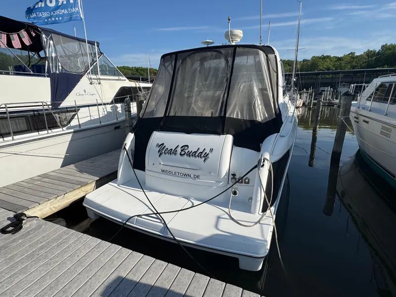 Slide: The Image of 2005 Formula 34 PC yacht docked at marina under clear blue sky. - 3